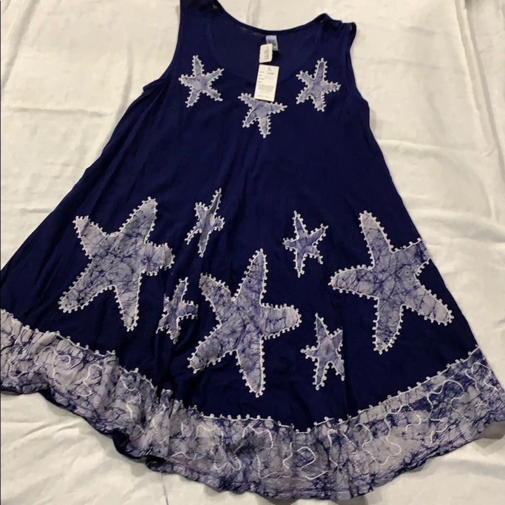 Unkown. BEACH DRESSES